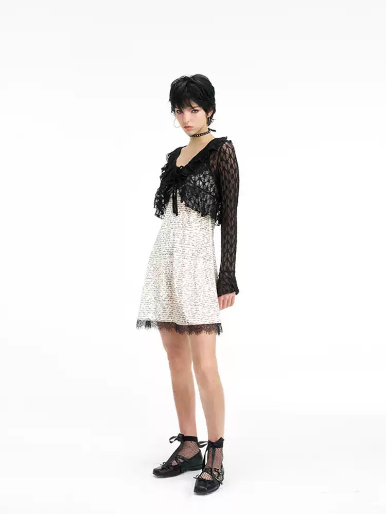 NEXT PASSPORT black lace cropped cardigan — angled view layered over a white dress.