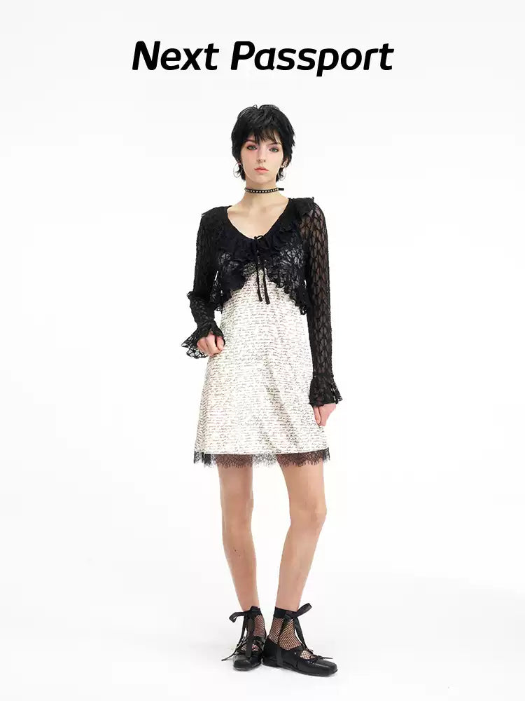 NEXT PASSPORT black lace cropped cardigan — front view layered over a white dress.