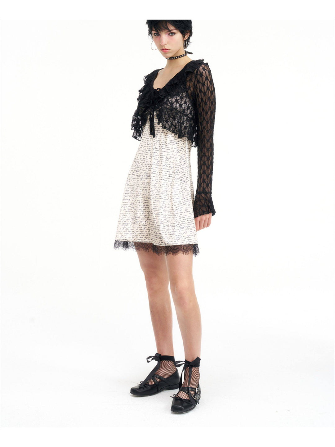NEXT PASSPORT black lace cropped cardigan — side layering view.