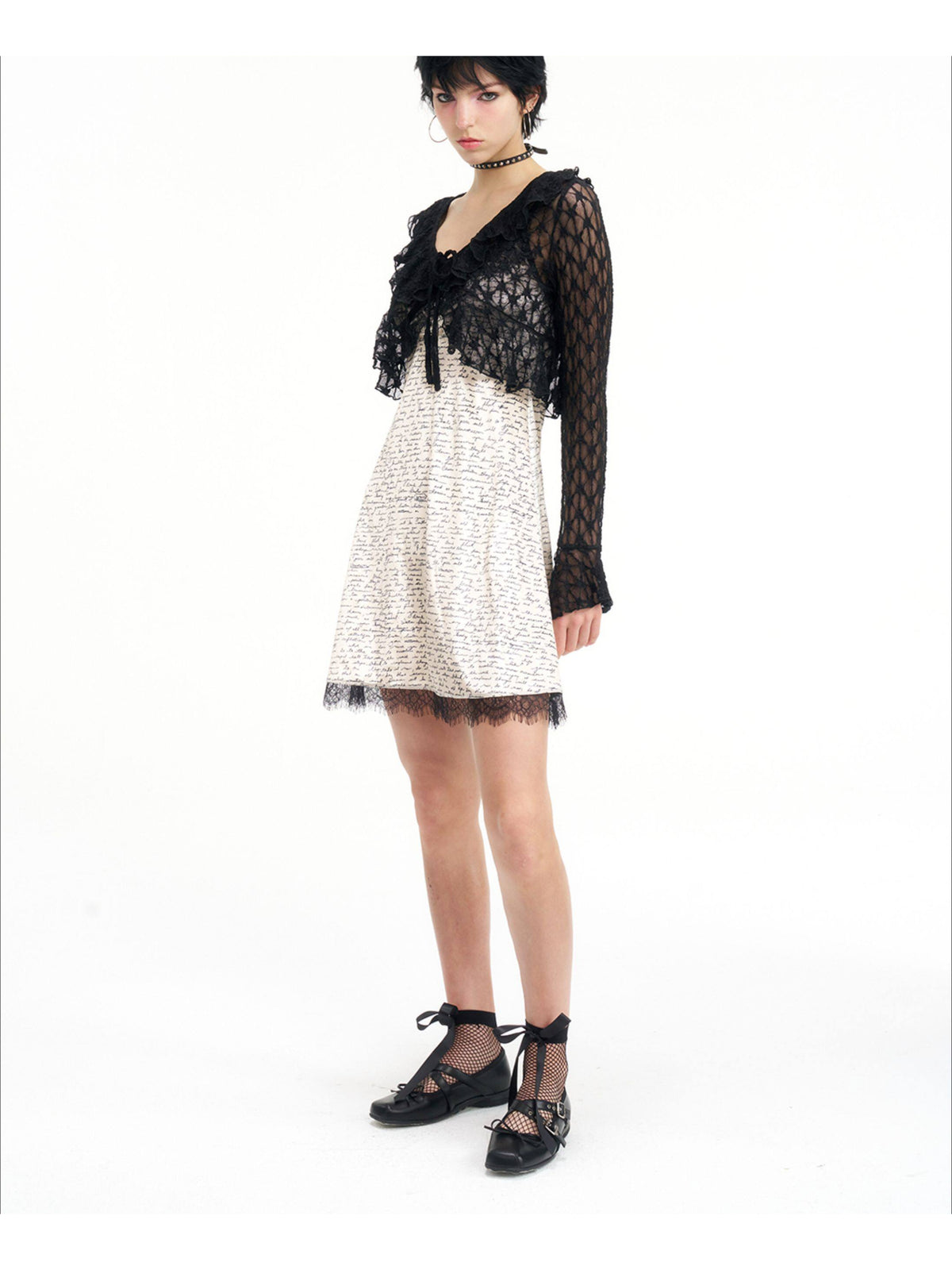 NEXT PASSPORT black lace cropped cardigan — side layering view.