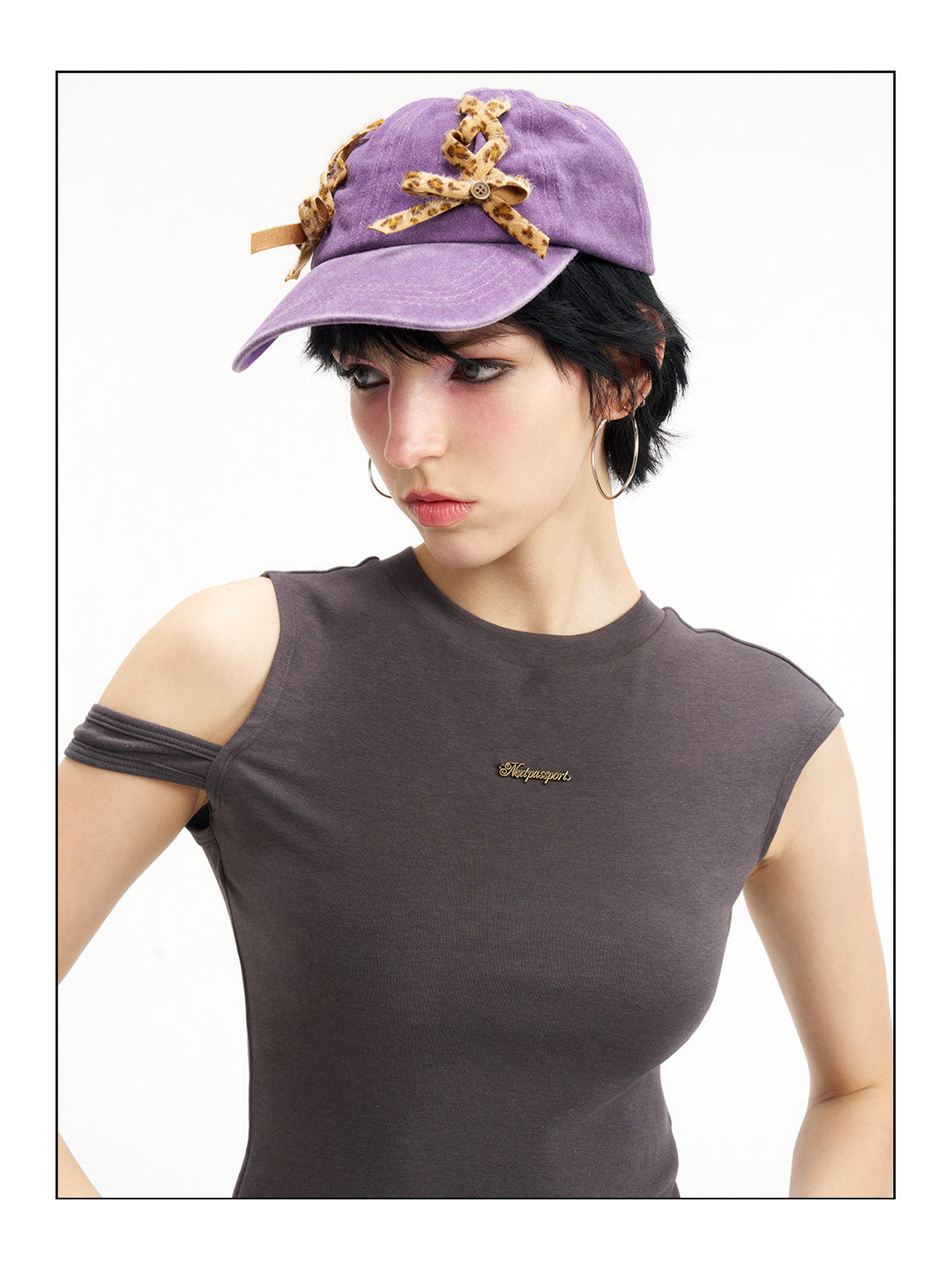 NEXT PASSPORT asymmetric cutout-shoulder sleeveless tee front detail