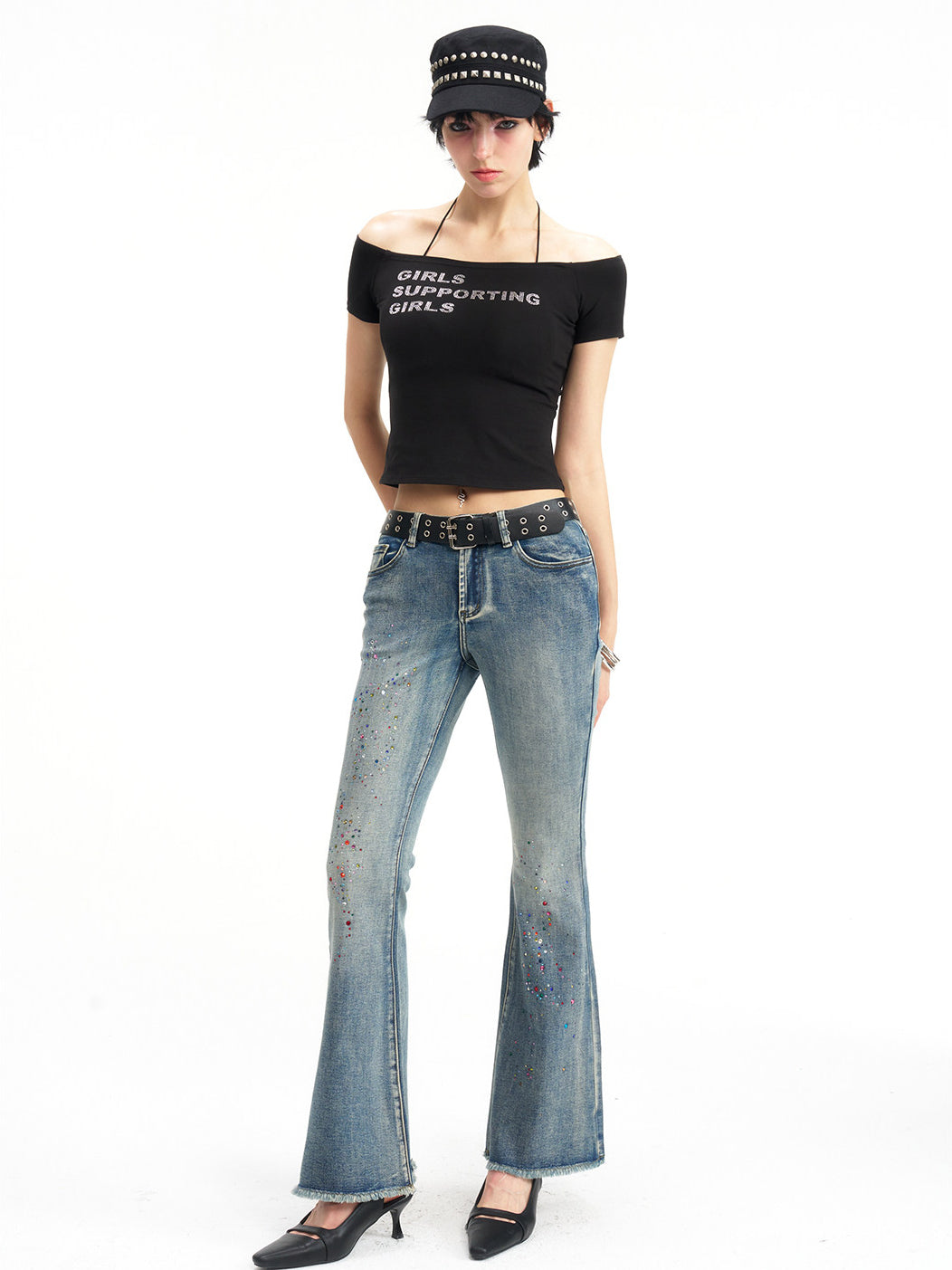 NEXT PASSPORT GIRLS SUPPORTING GIRLS rhinestone off-shoulder crop tee — black full-body modeled front view.