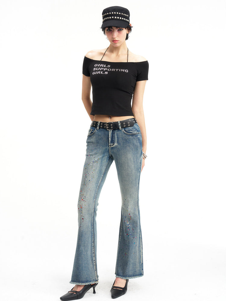 NEXT PASSPORT GIRLS SUPPORTING GIRLS rhinestone off-shoulder crop tee — black full-body modeled front view.