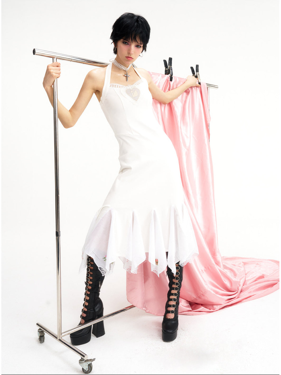 NEXT PASSPORT swan-embroidered lace ballet dress in ivory — long halter-length editorial studio view.