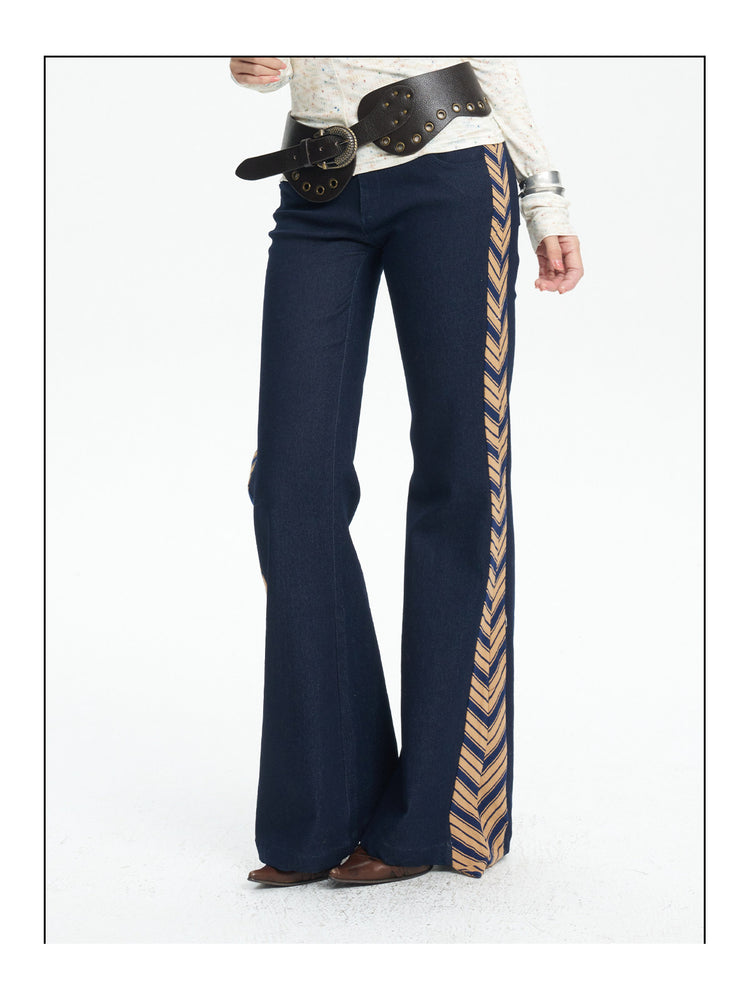 NEXT PASSPORT striped tie-panel flared pants in denim blue — striped side-panel detail.