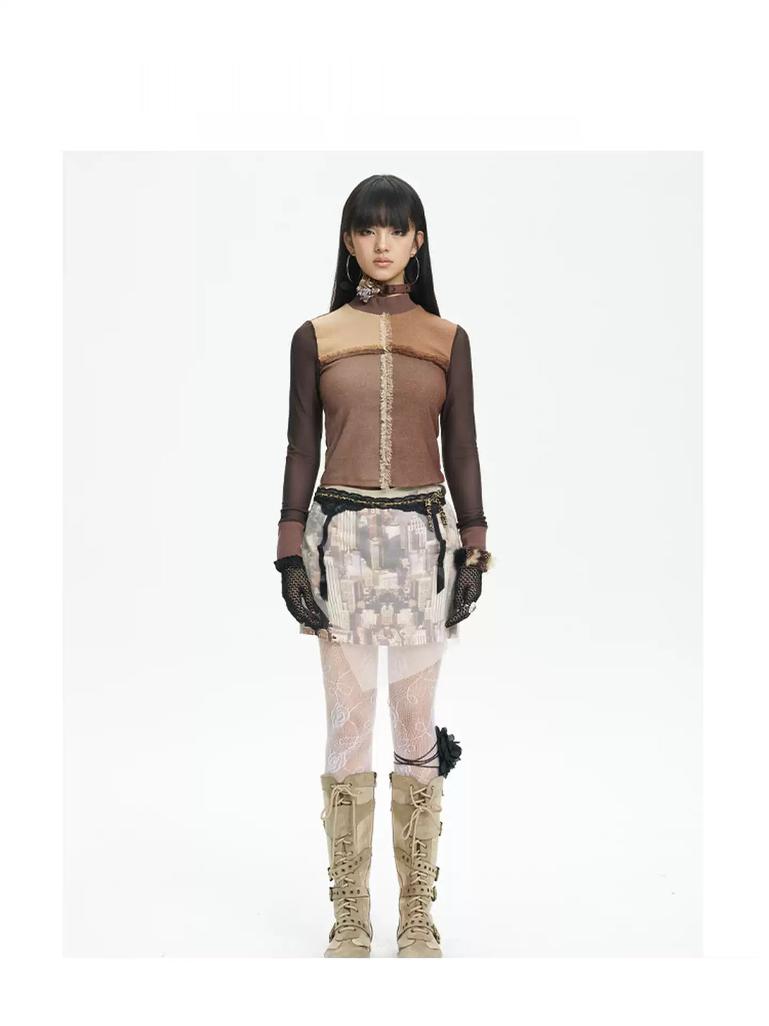 NEXT PASSPORT HAZY CITY mesh double-waist mini skirt — front full-length modeled view showing the khaki city print and asymmetric mesh overlay.