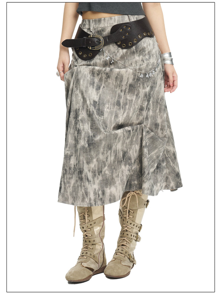 NEXT PASSPORT gray crinkled-print midi skirt angled front styling view.
