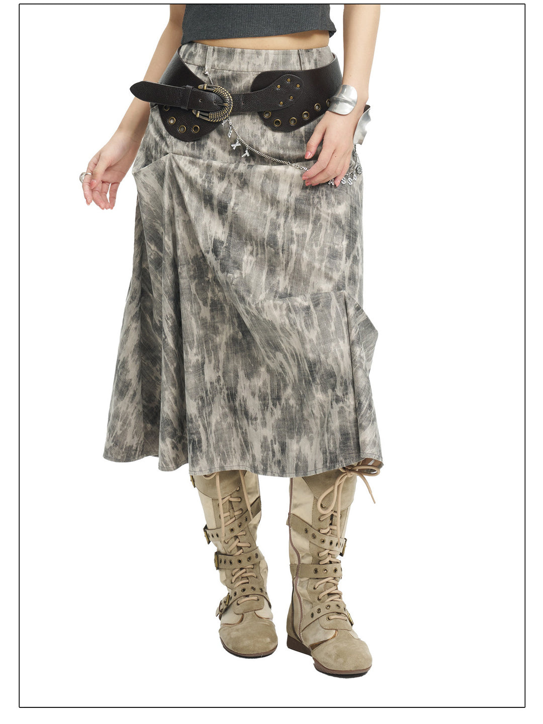 NEXT PASSPORT gray crinkled-print midi skirt modeled front view with tan boots.