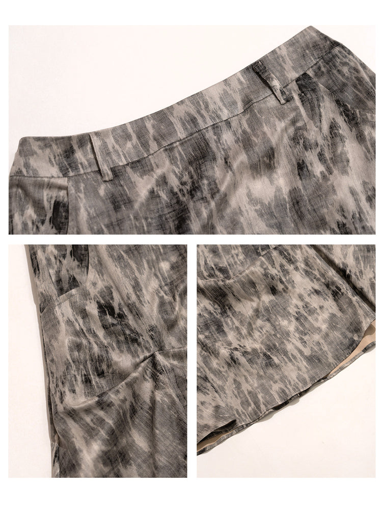NEXT PASSPORT gray crinkled-print midi skirt waistband, print and construction details.