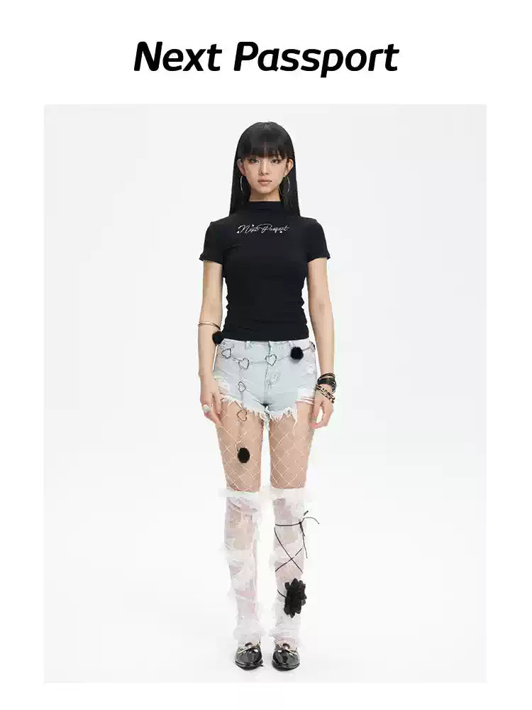 NEXT PASSPORT distressed fringe denim shorts in denim blue — full-length front modeled view with white leg warmers.