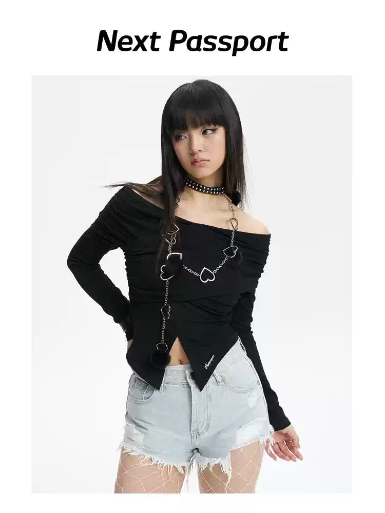 NEXT PASSPORT distressed fringe denim shorts in denim blue — three-quarter modeled view showing the irregular fringe and distressing.