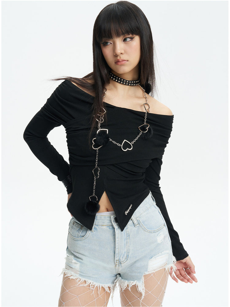 NEXT PASSPORT distressed fringe denim shorts in denim blue — three-quarter modeled view showing the irregular fringe and distressing.