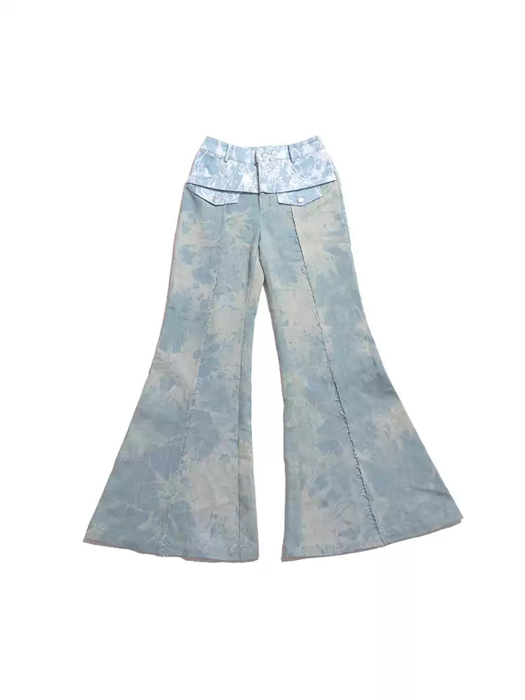 NEXT PASSPORT printed lace-panel flared jeans in pale blue — garment-only front view on white.
