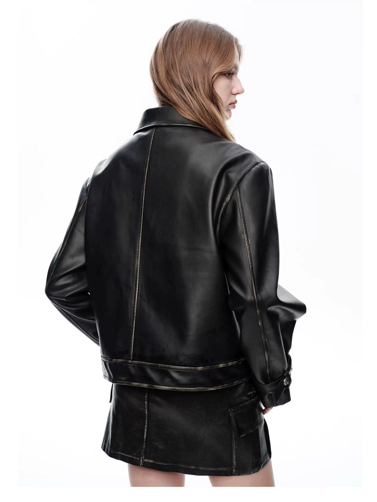 NEXT PASSPORT distressed black PU jacket and cargo-pocket mini skirt set, back view