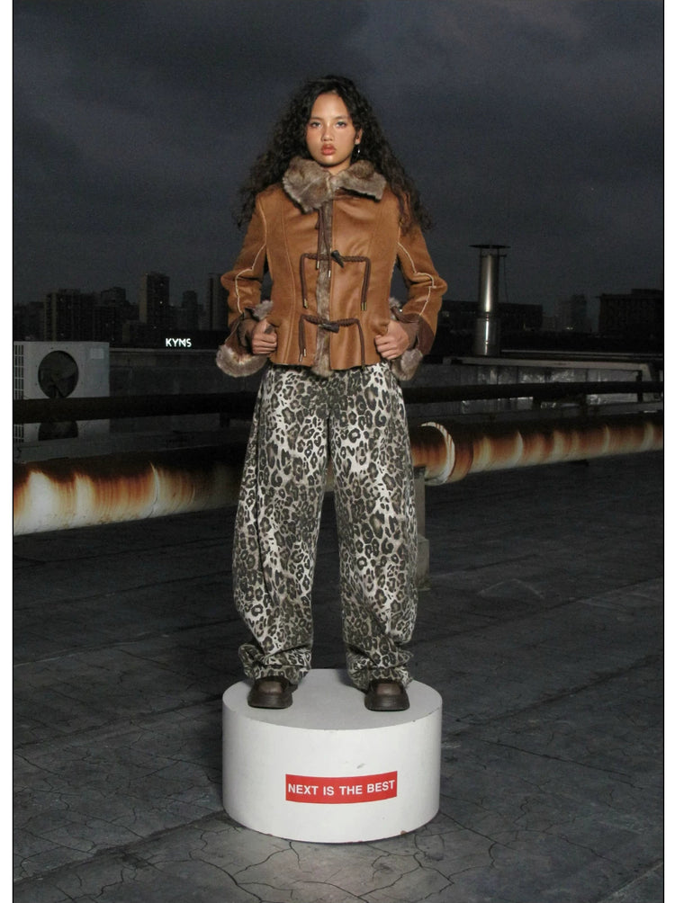 NEXT PASSPORT dark-brown rope-toggle shearling cropped jacket, nighttime rooftop full-length platform pose