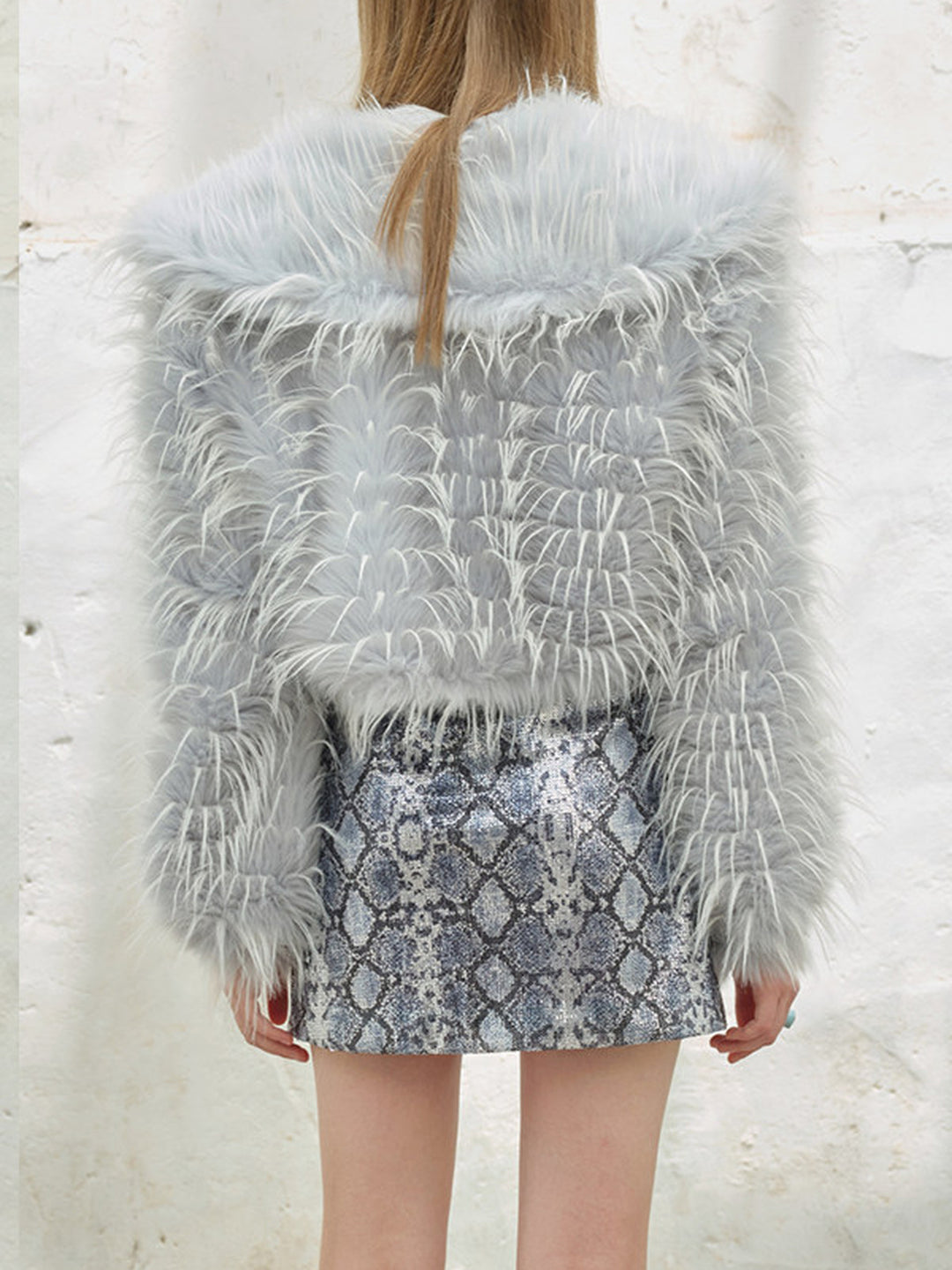 NEXT PASSPORT icy-blue long-pile faux-fur cropped jacket — back construction detail.