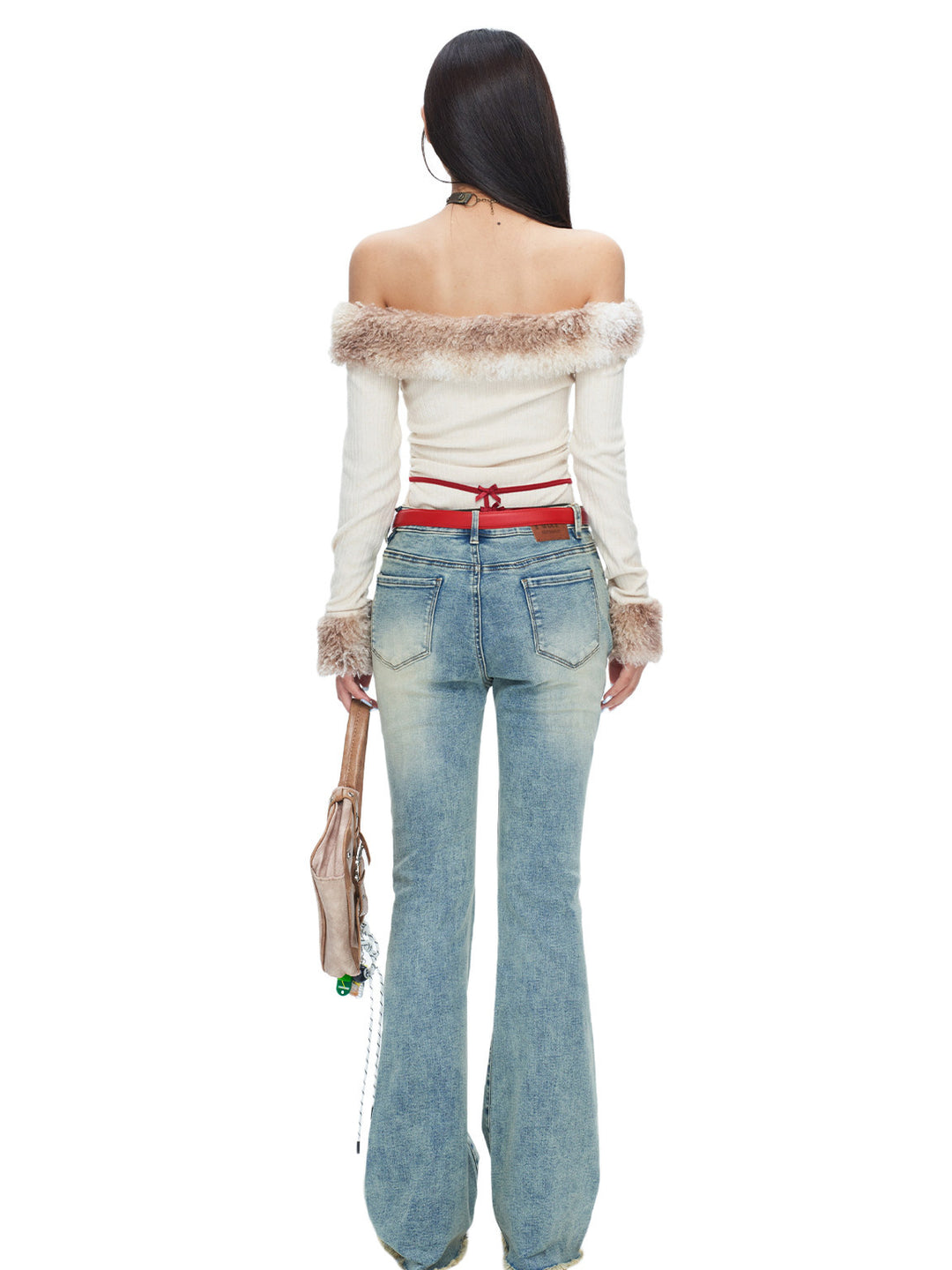 NEXT PASSPORT vintage light-wash stretch flared jeans in blue — rear modeled studio view.