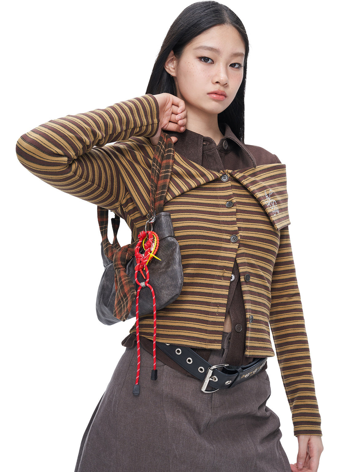 Rear studio view of the NEXT PASSPORT brown-yellow striped off-shoulder cardigan