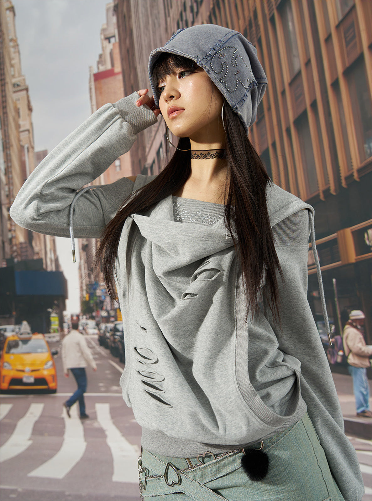 NEXT PASSPORT washed rhinestone blue-gray slouch beanie — street styling view with a gray layered look