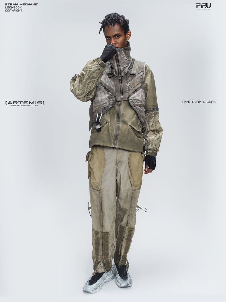 PIONEER mercury-brown detachable-sleeve jacket — full-length modeled view with hand at the collar and layered vest