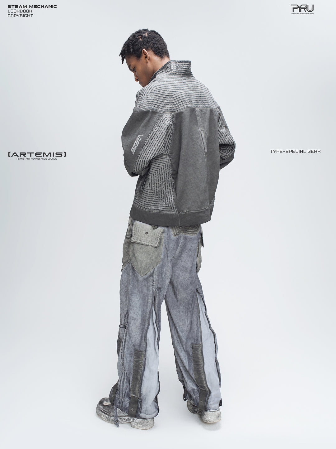 STARCORE moon dust gray engineer utility pants — full rear three-quarter modeled view