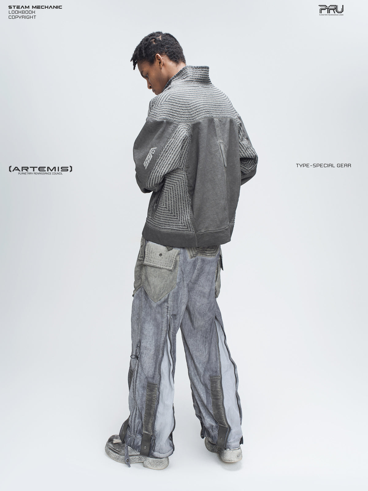 STARCORE moon dust gray engineer utility pants — full rear three-quarter modeled view