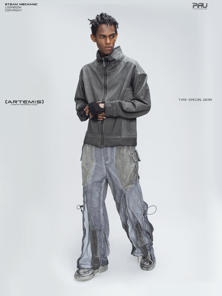 STARCORE moon dust gray engineer utility pants — full front modeled view with hands clasped