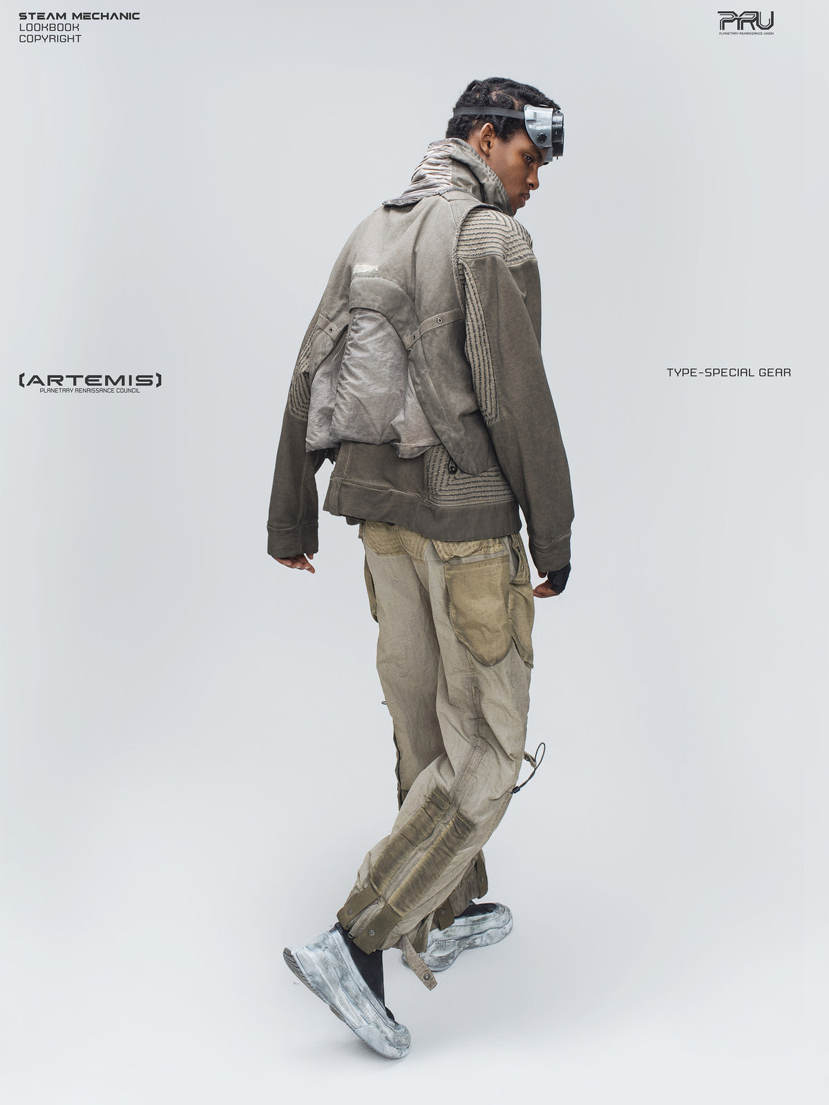 STARCORE mercury brown engineer utility pants — full rear three-quarter modeled walking view