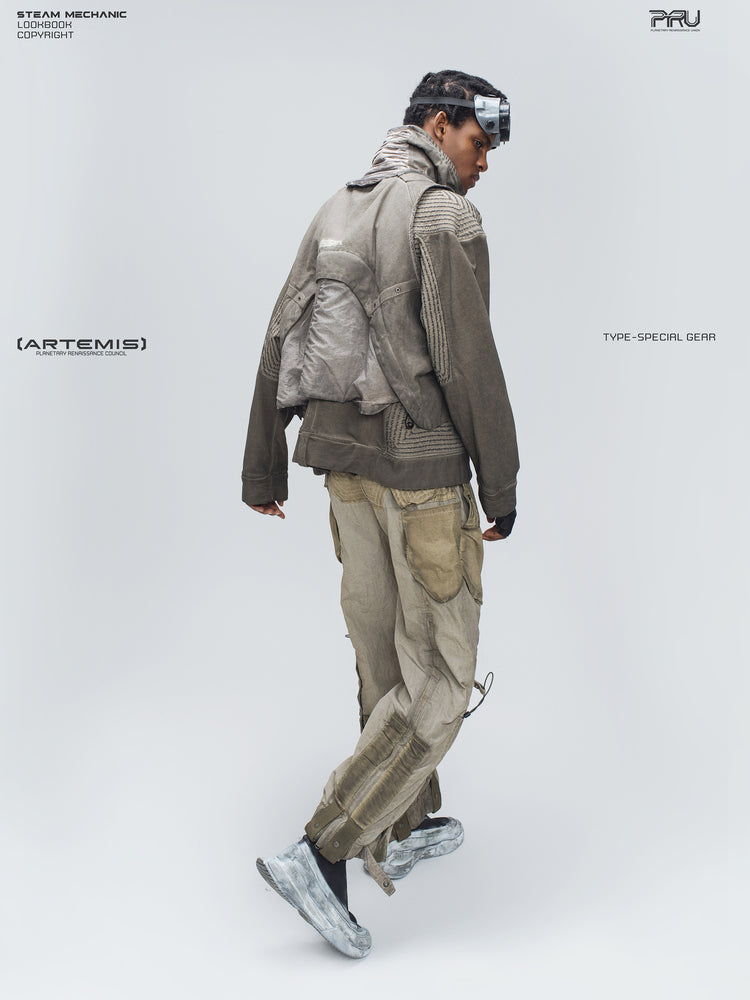 STARCORE mercury brown engineer utility pants — full rear three-quarter modeled walking view