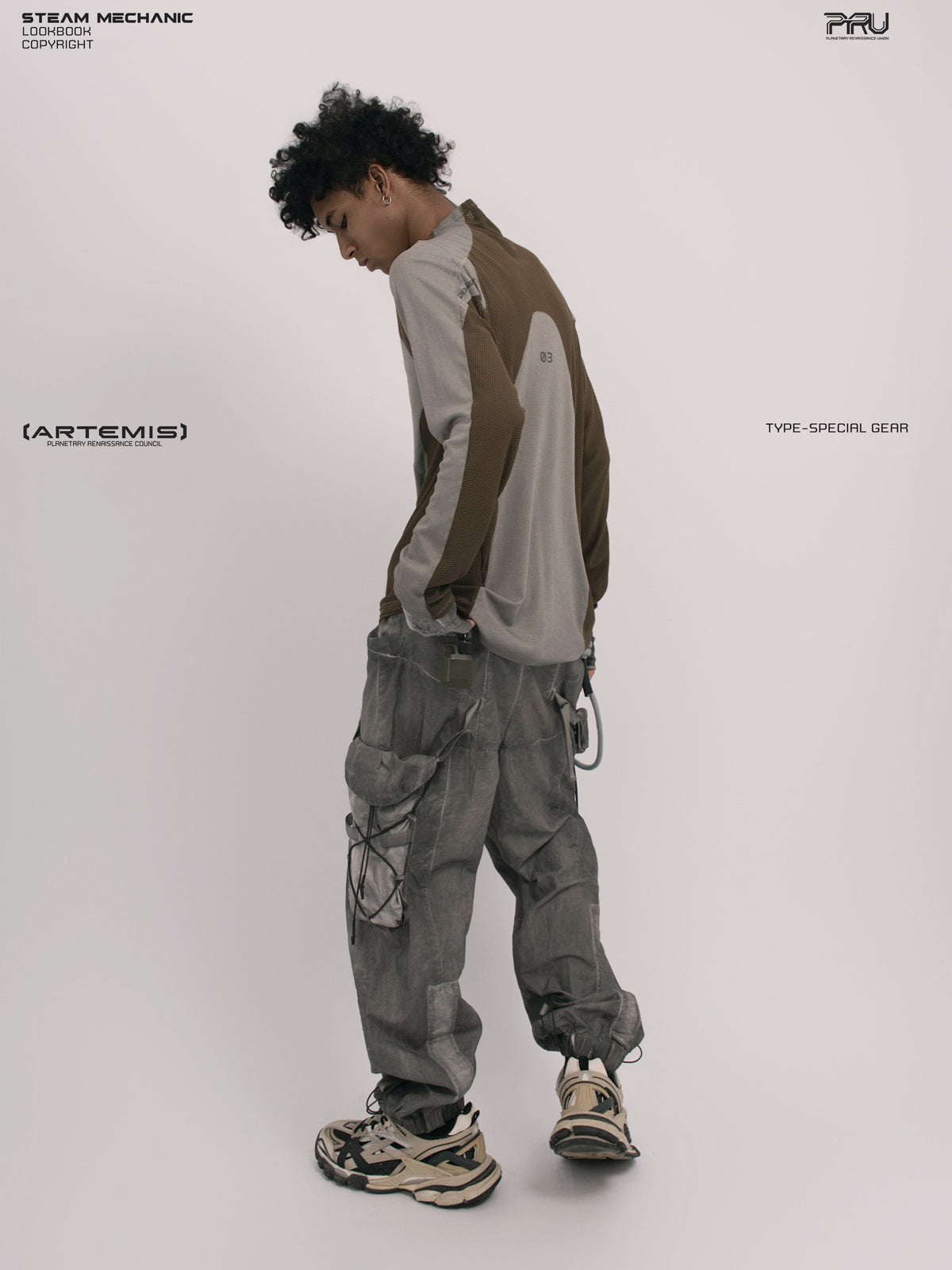 STARCORE ash tundra mesh-panel long-sleeve top b — rear three-quarter modeled view looking down to the left