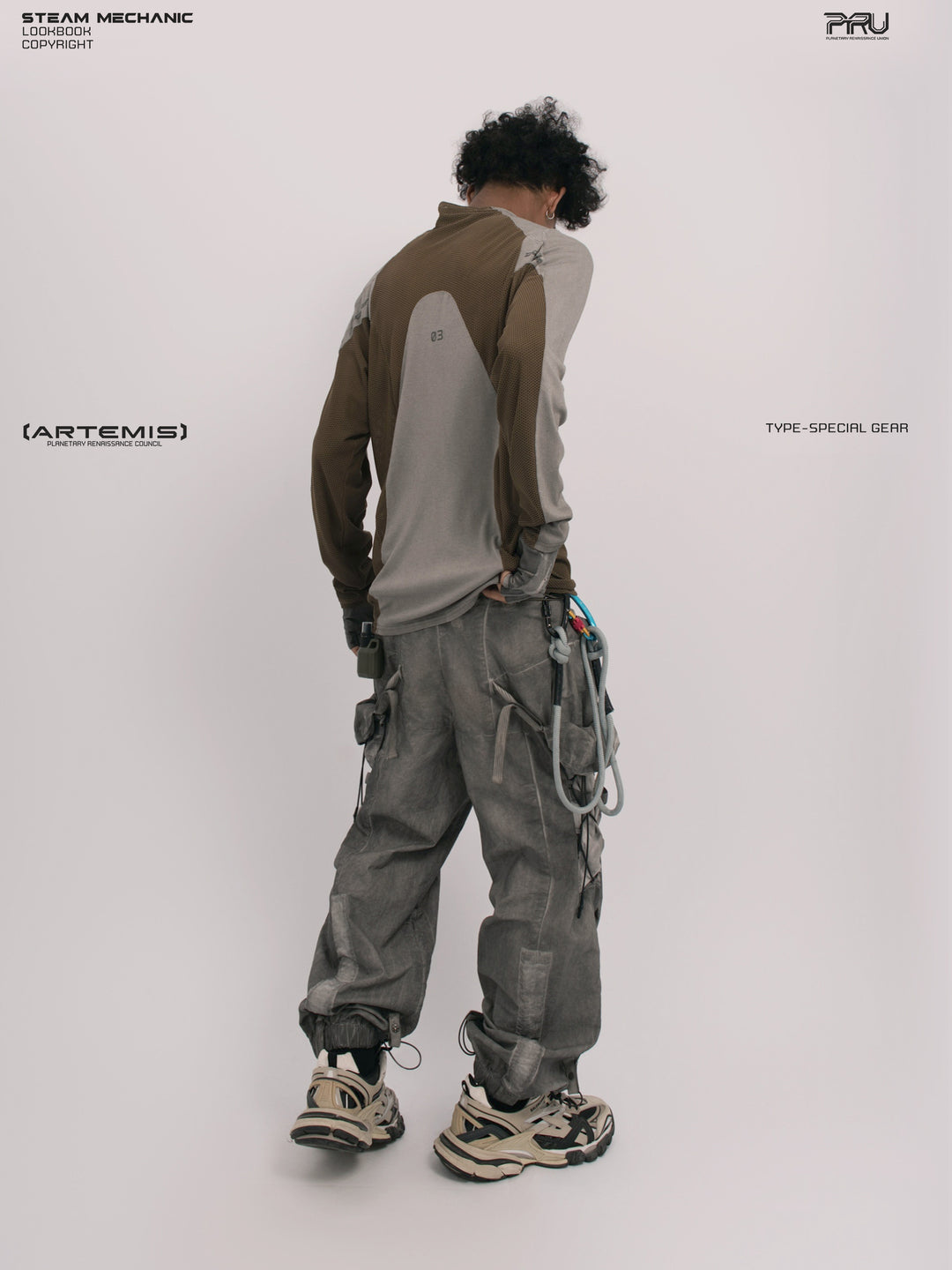 STARCORE ash tundra mesh-panel long-sleeve top b — rear three-quarter modeled view looking down to the right