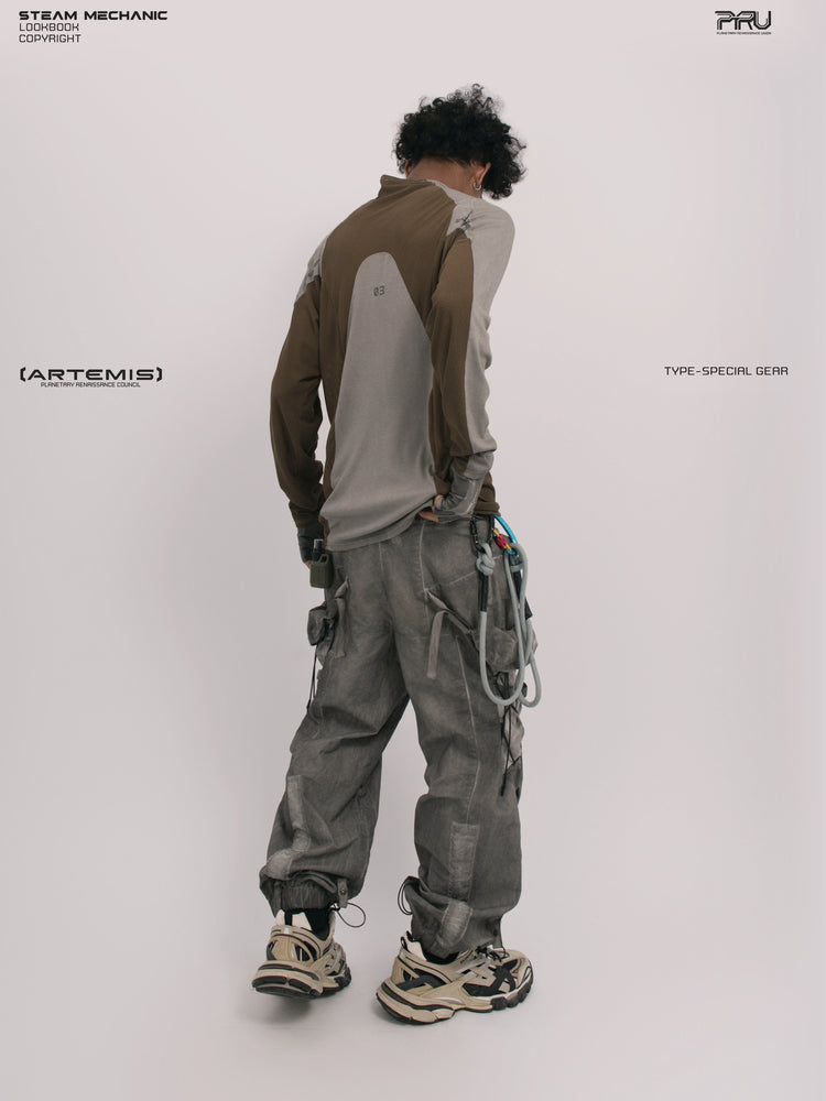STARCORE ash tundra mesh-panel long-sleeve top b — rear three-quarter modeled view looking down to the right