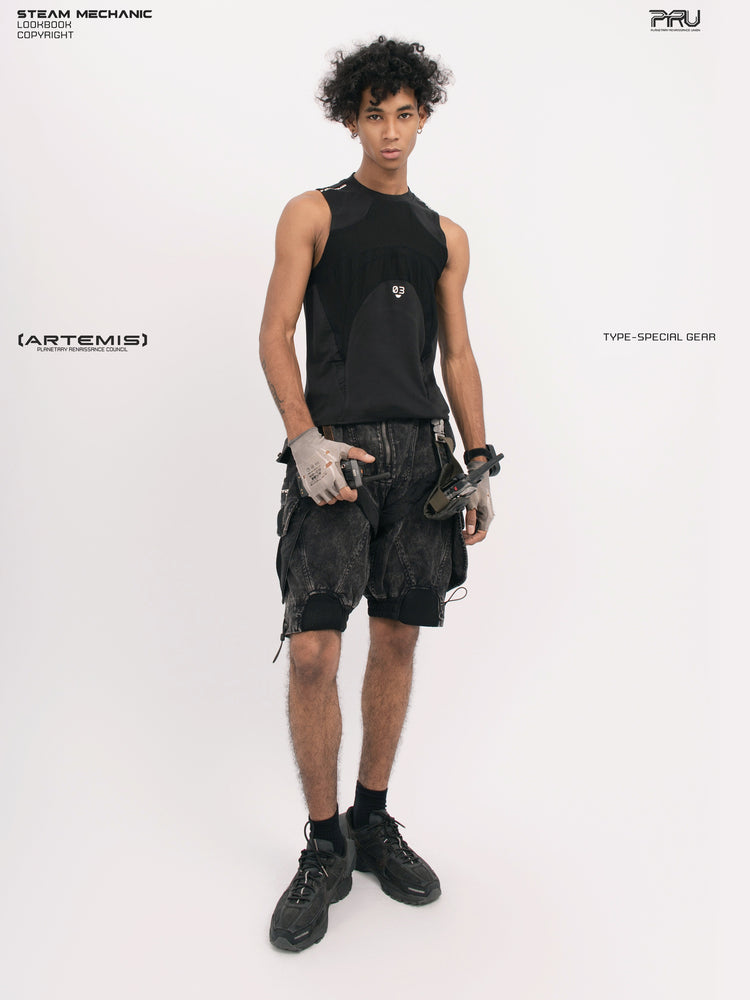 ARTEMIS blackbird black detachable technical shorts — full-length styled view with black tank and hand in pocket