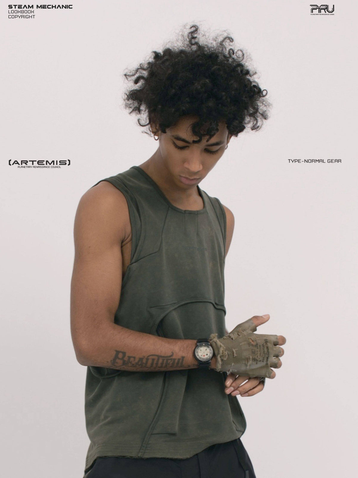 RIFT ARC moss green deconstructed tank — modeled close-up with hands together showing the layered front panel