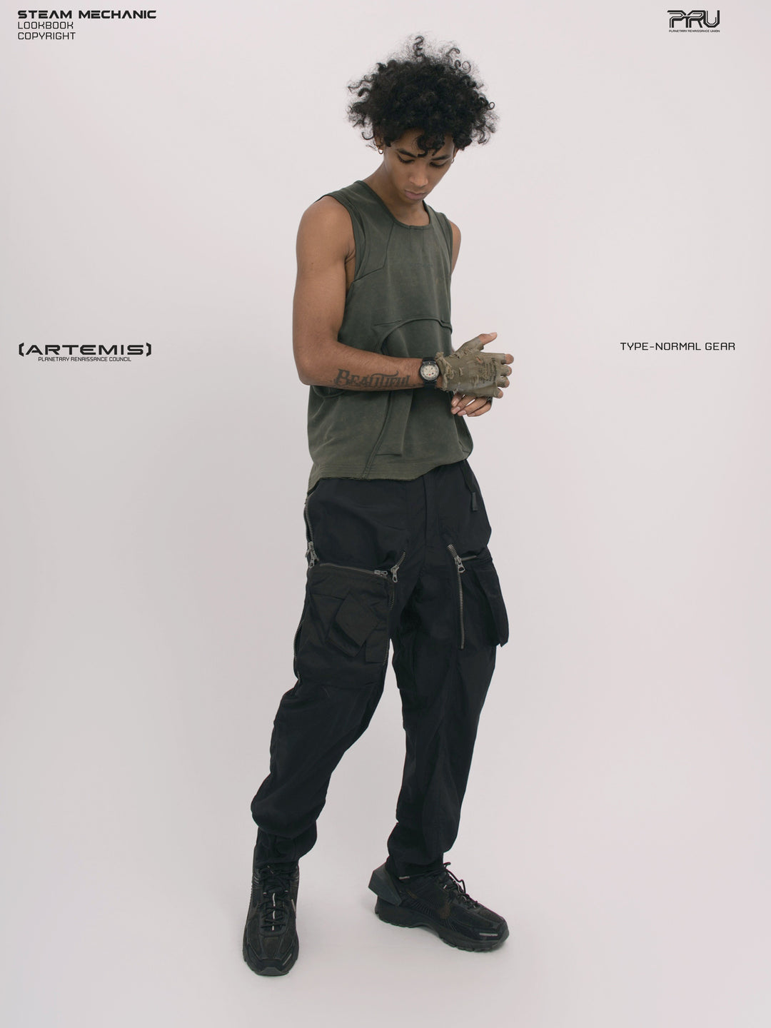 RIFT ARC moss green deconstructed tank — modeled view with hands together
