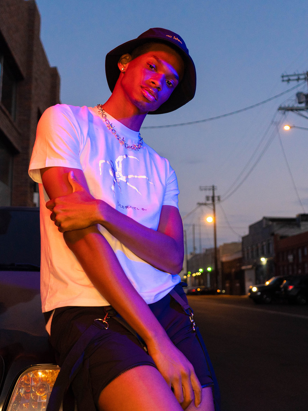 NO IDEA hat, black hat in a tilted-head editorial portrait