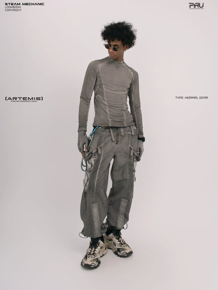 TWIN STAR meteor gray stretch riding base-layer top — full-length front view looking to the side