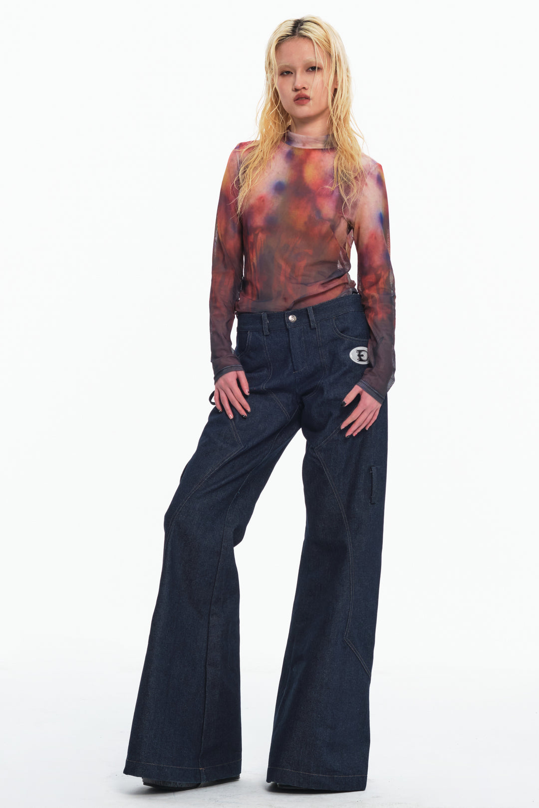 EMBRYO BONE FRAME low-rise flare pants & waist panel — full-length modeled view
