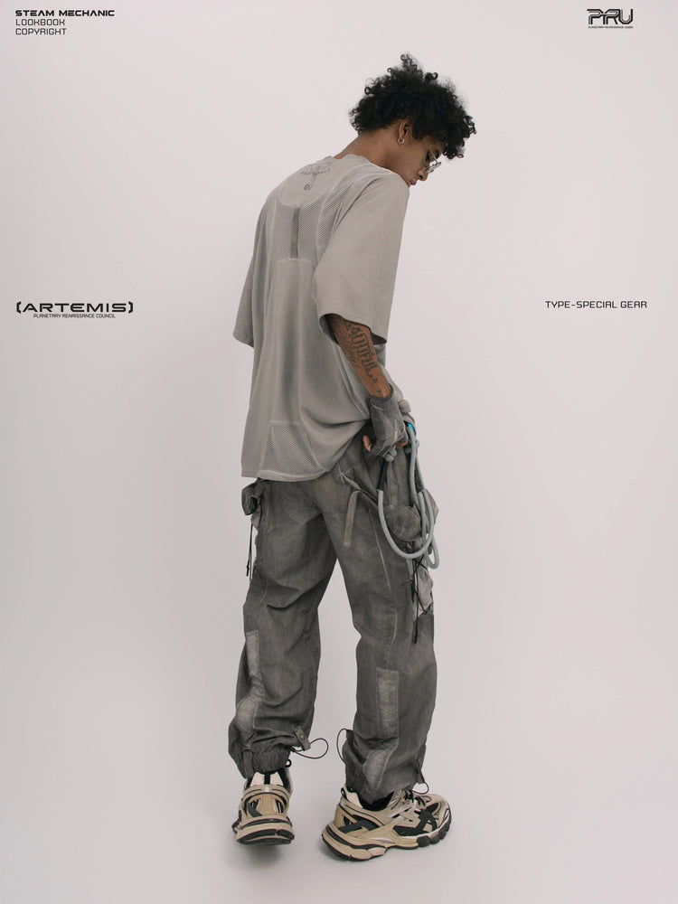 STARFIELD WELDER lunar sea gray distressed mesh tee — rear three-quarter view looking down