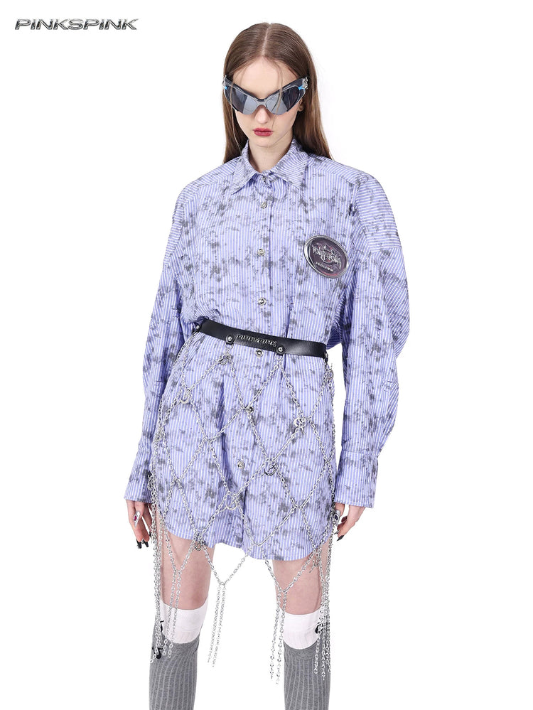 PINKSPINK ELECTRIC MOON diamond-chain belt skirt in black and silver — closer front modeled view layered over a purple shirt
