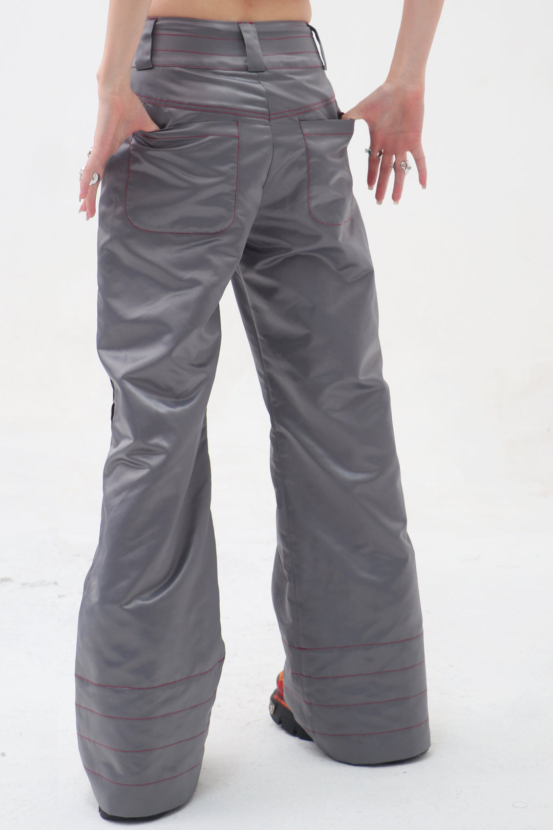 EMBRYO STARSHIFT ruched 3D-effect pants — full-length modeled view