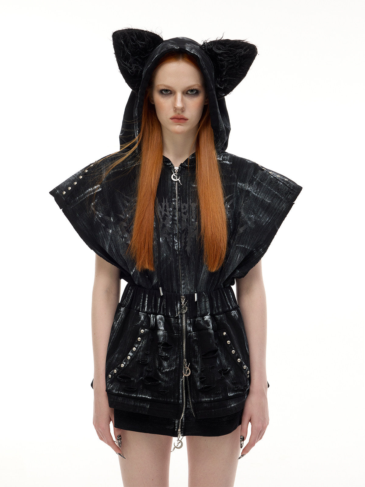 PINKSPINK ELECTRIC MOON studded cat-ear vest in black — front close-up with the hood raised showing textured cat ears and crescent zip pulls