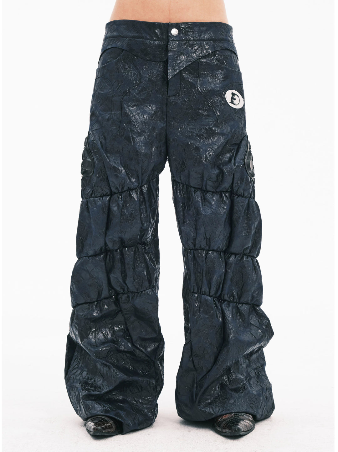 EMBRYO GUARD SHELL ruched PU leather flare pants — front modeled view