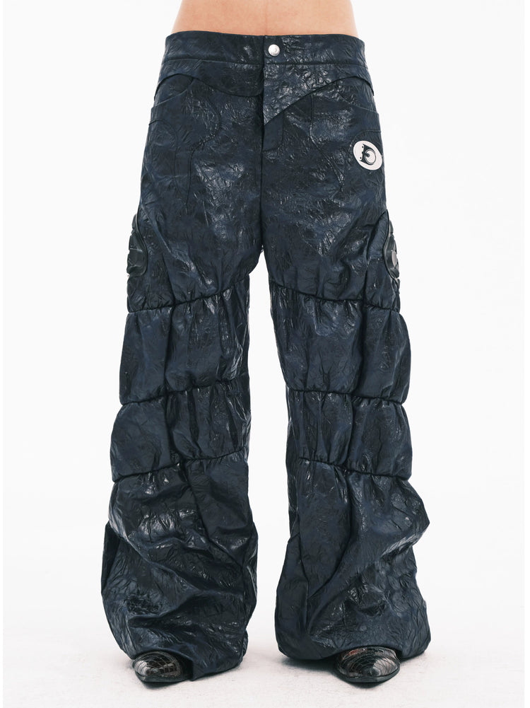 EMBRYO GUARD SHELL ruched PU leather flare pants — front modeled view