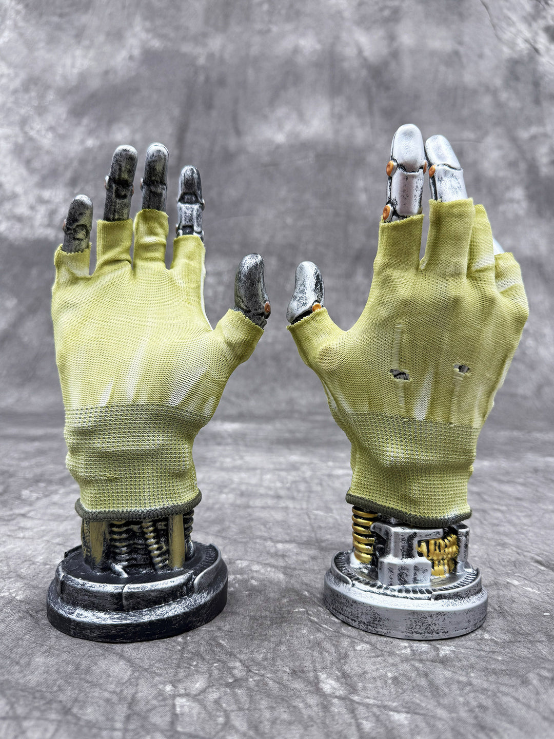 PRECISION CASTING distressed fingerless gloves in nebula green, NO GLUE — uncoated palm and distressed back views on display hands