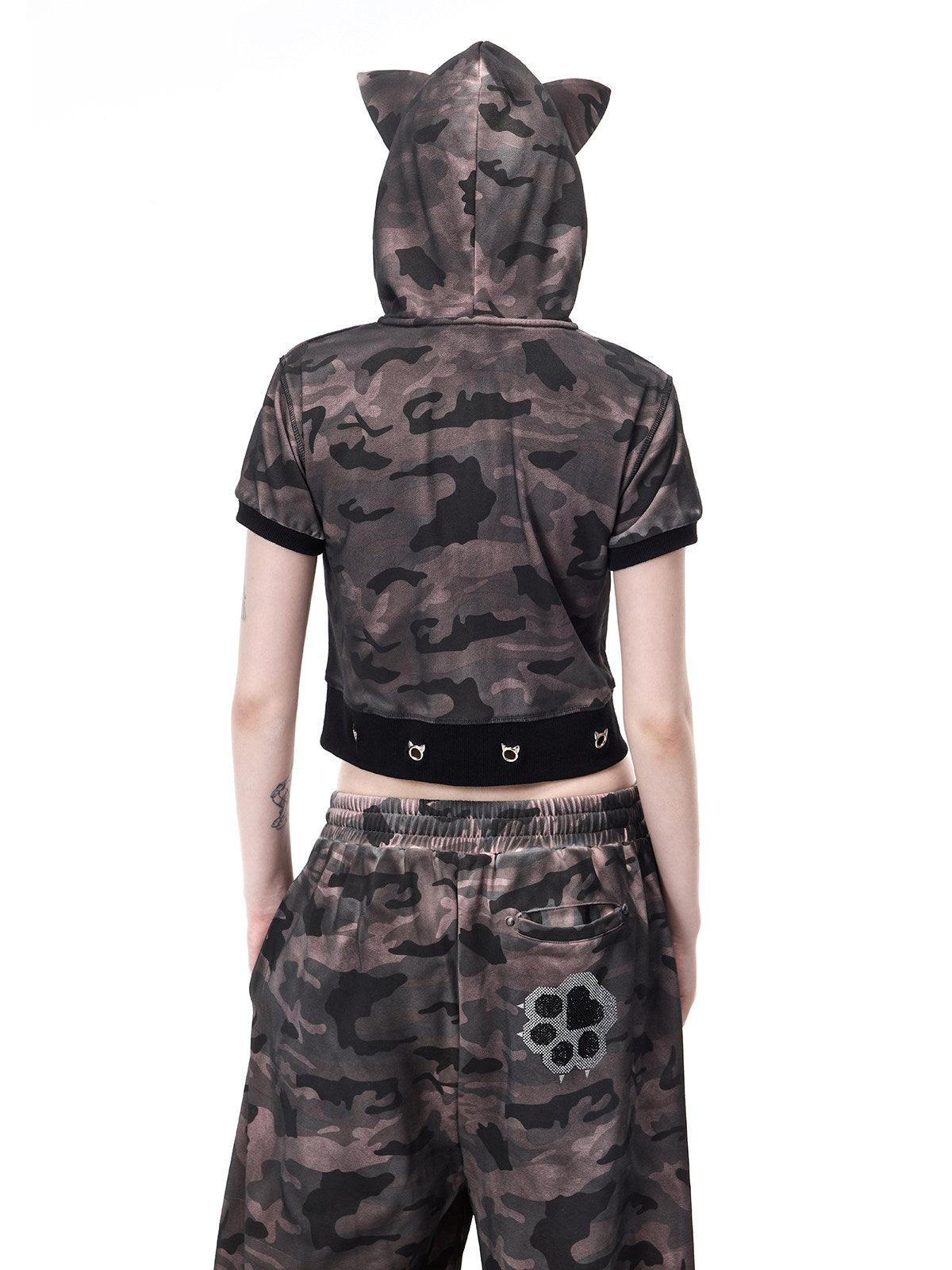 PINKSPINK CATPAW cropped cat-ear zip hoodie in gray-brown camouflage — rear close-up of pointed hood ears and hem eyelet details