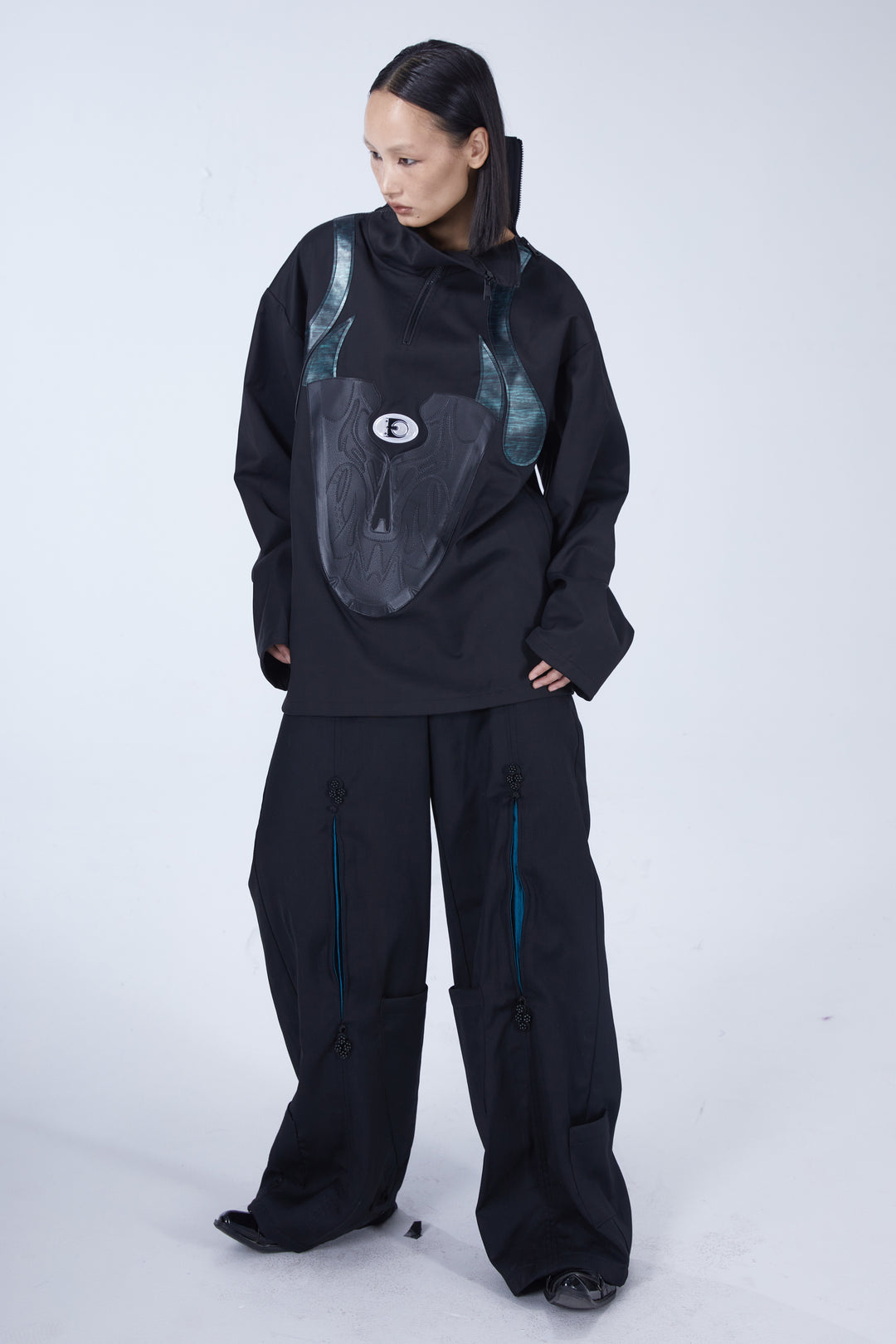 EMBRYO SHOE COLLAR asymmetrical sweatshirt — material and hardware detail
