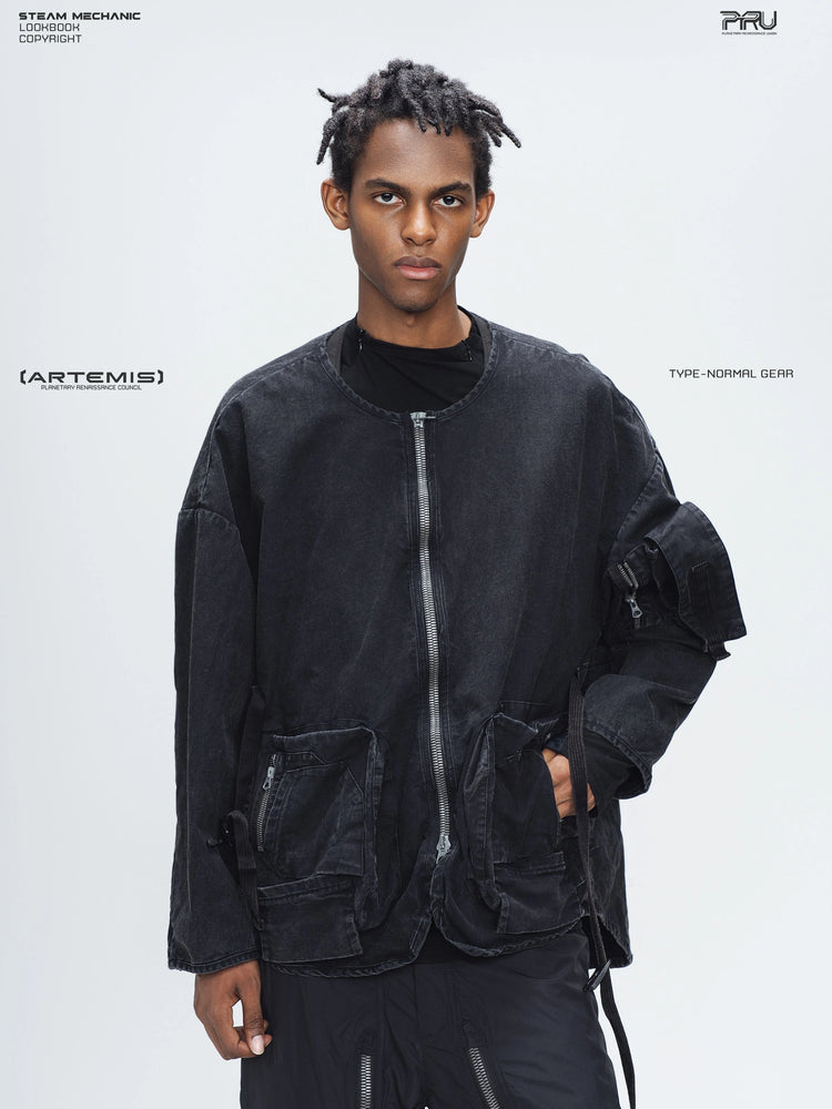 GAIA night black priest zip robe jacket — front modeled view with hand in pocket showing the sleeve utility pocket
