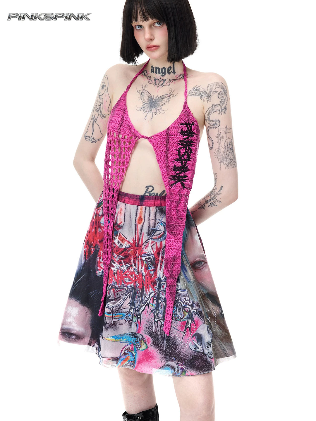 PINKSPINK THORNSTAR open-knit halter top in hot pink — three-quarter front modeled view showing the pointed star-shaped panels
