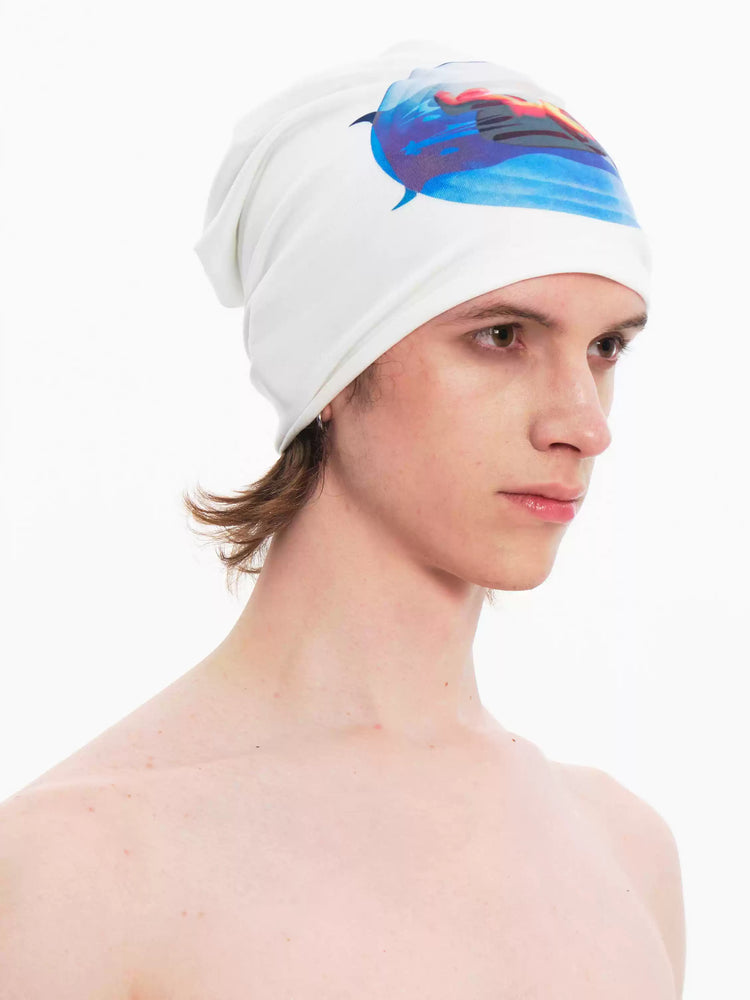 EMBRYO PLAN white graphic slouch beanie — front modeled view